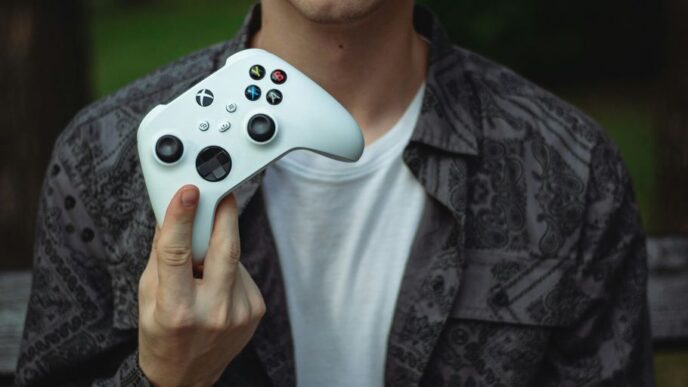 a person holding a video game controller