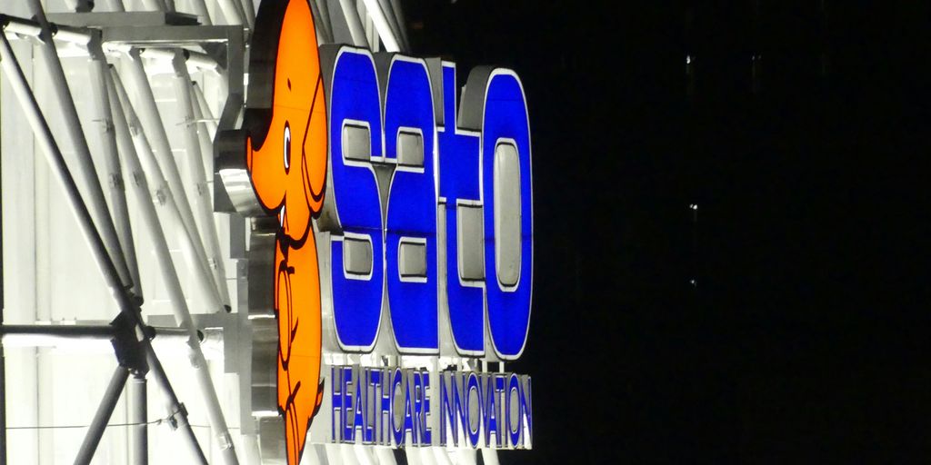 a close up of a sign on the side of a building