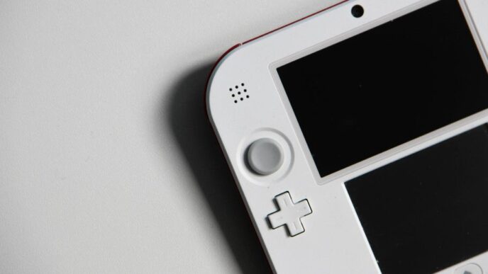 white nintendo game boy on white table