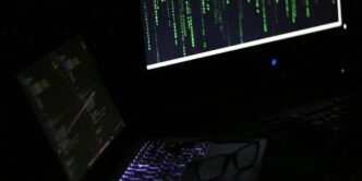 A laptop computer sitting on top of a desk