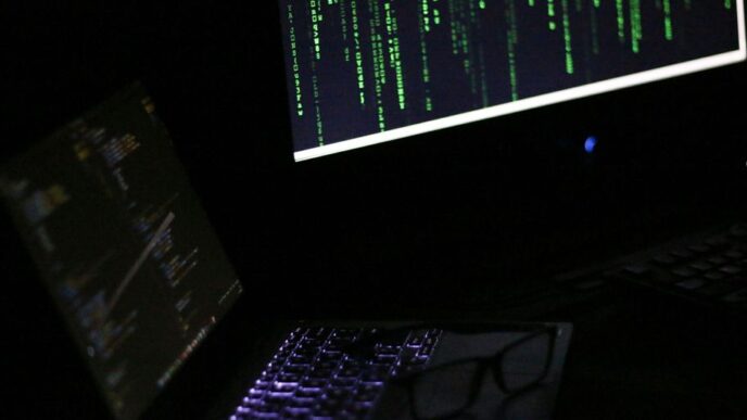 A laptop computer sitting on top of a desk