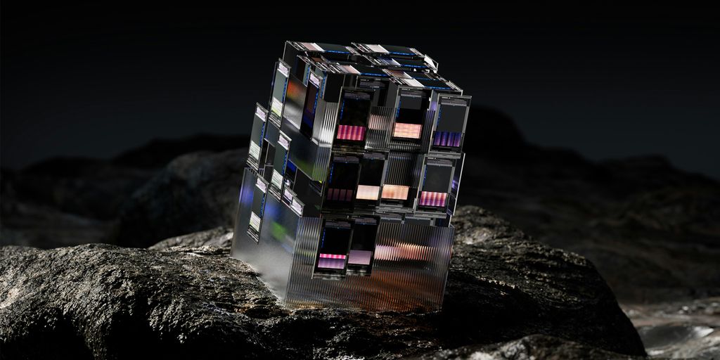 a cube shaped building on a rock