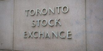 a sign on the side of a building that says toronto stock exchange