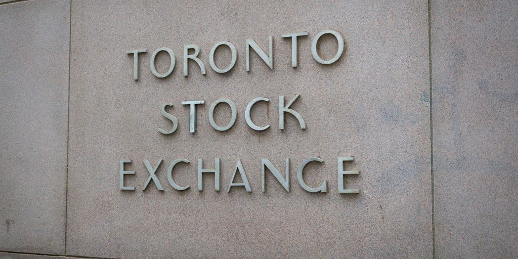 a sign on the side of a building that says toronto stock exchange