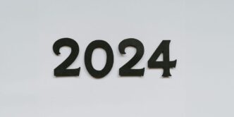 a white wall with a black number on it