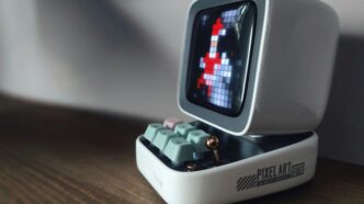 an old computer with a game on the screen