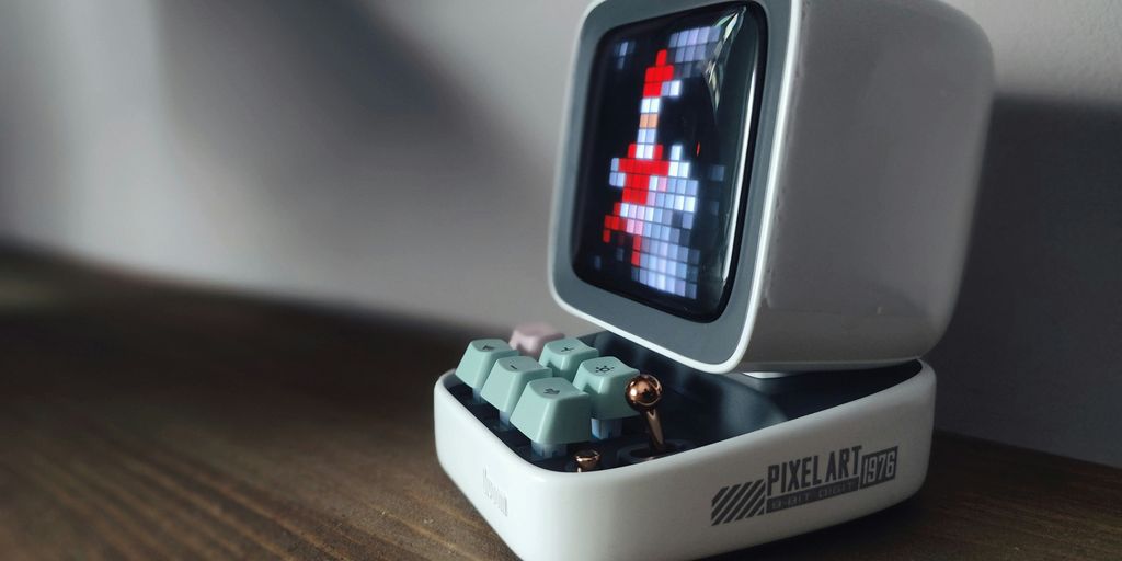an old computer with a game on the screen