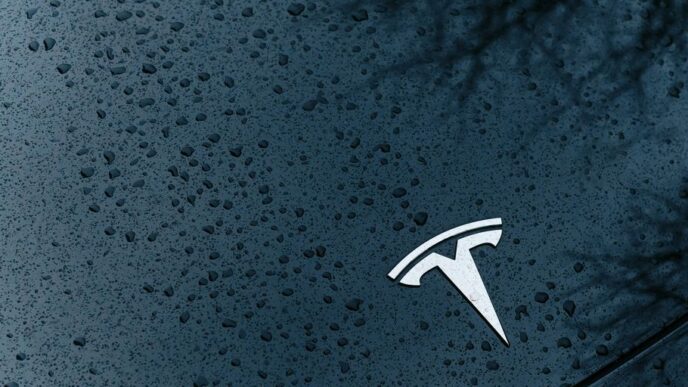 A close up of a car window with rain drops