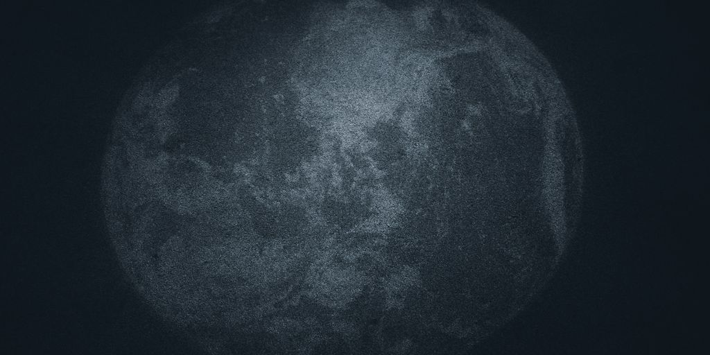 a black and white photo of the moon