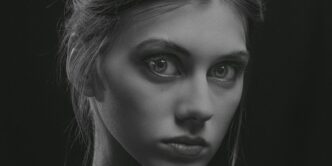 a black and white photo of a woman's face