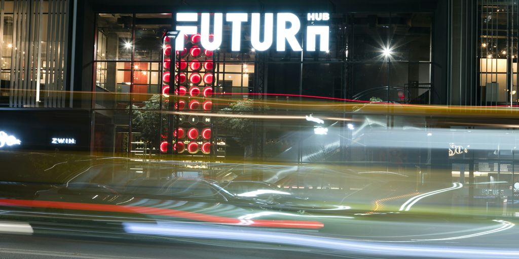 a blurry photo of a building at night