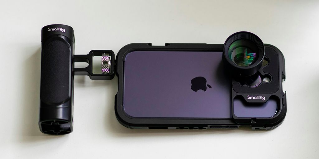 an iphone with a camera attached to it