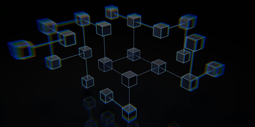 a group of cubes that are on a black surface