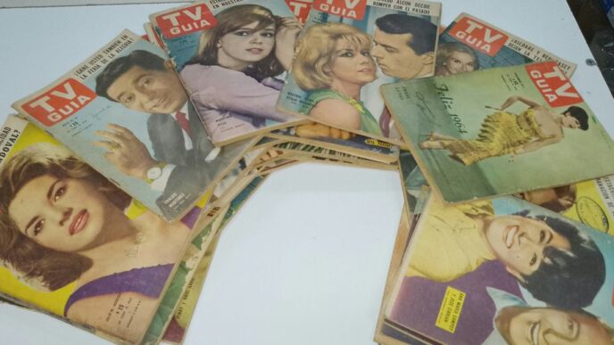 a bunch of magazines sitting on top of a table