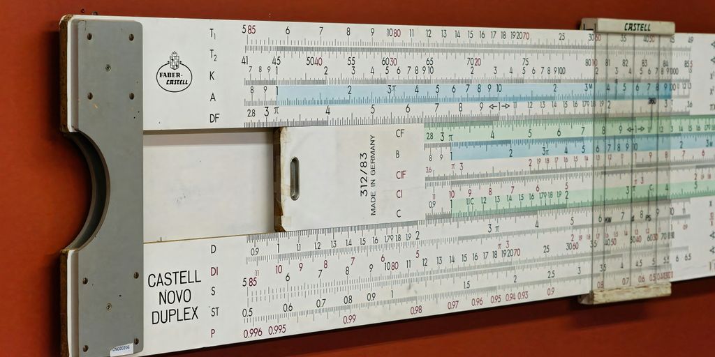 A large ruler mounted to the side of a wall