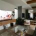 A living room filled with furniture and a flat screen TV