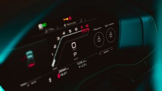 a close up of a car dashboard with a speedometer