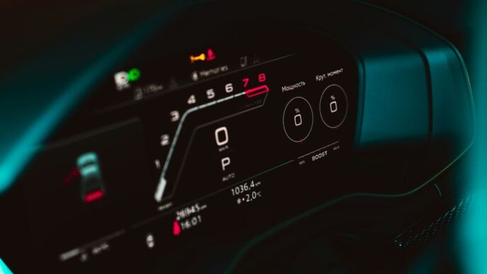 a close up of a car dashboard with a speedometer
