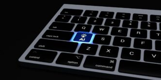 a close up of a keyboard on a black surface