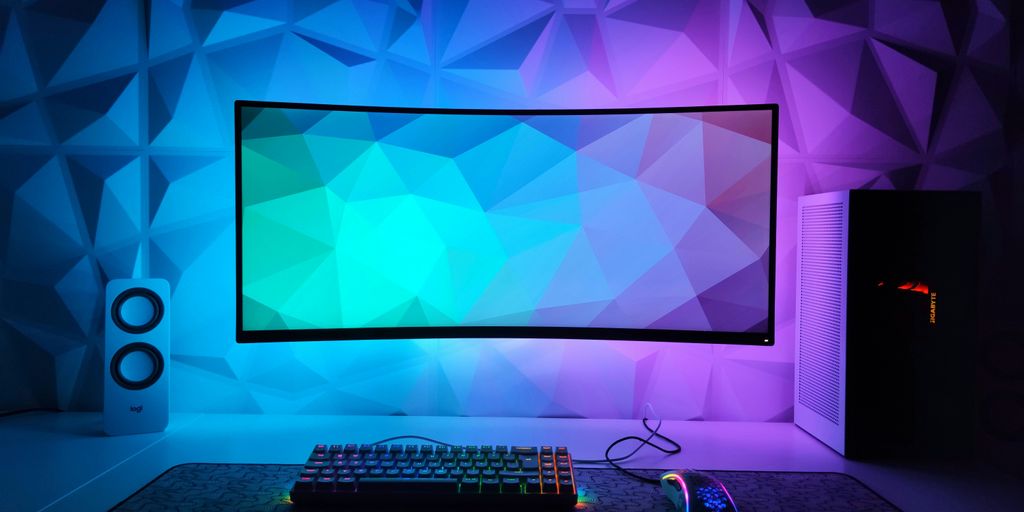 a computer monitor sitting on top of a desk