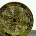 a close up of a coin on a table