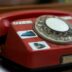 red and silver rotary phone