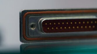a close up of a metal object with a reflection on the surface