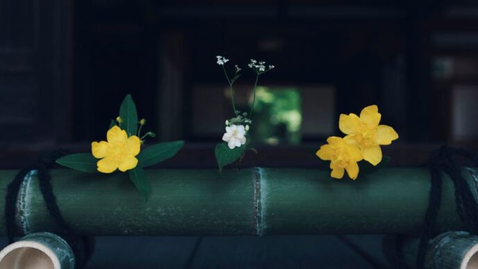 yellow flower on green bamboo