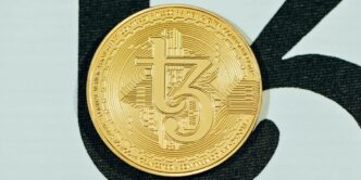 a close up of a coin on a white surface