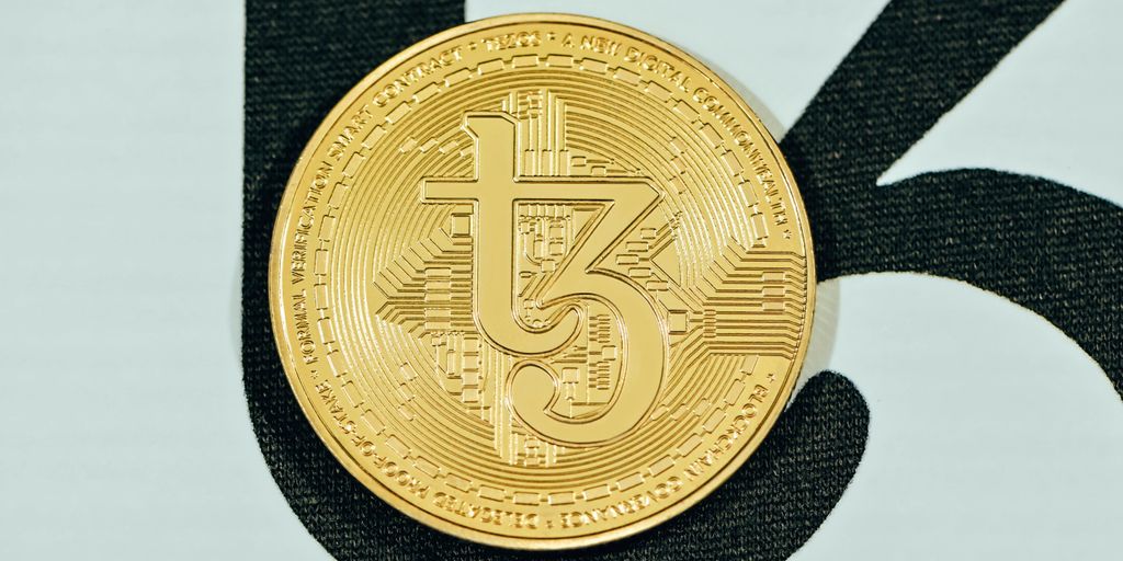 a close up of a coin on a white surface