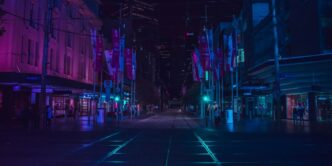 people walking on walkway during nighttime