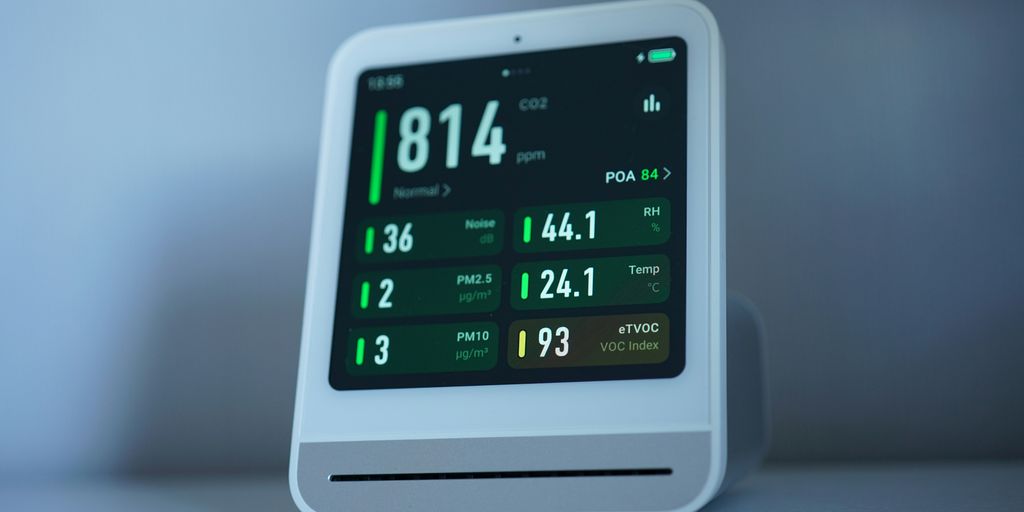 Air quality monitor shows levels of pollutants.