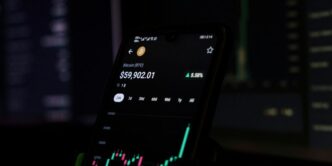 a cell phone displaying a stock chart on the screen