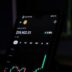 a cell phone displaying a stock chart on the screen