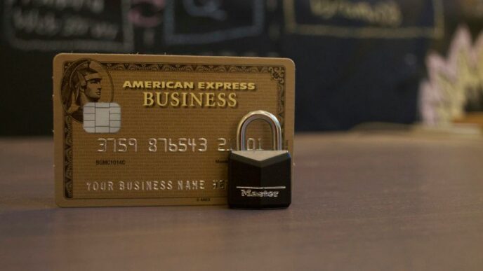closeup photo of American Express Business card on brown surface