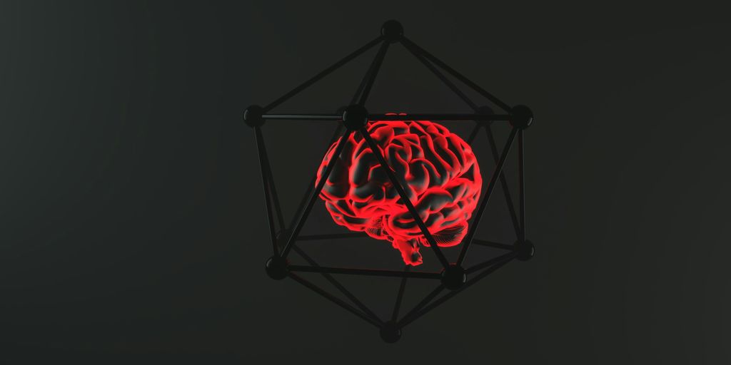 Glowing brain encased in a geometric structure.
