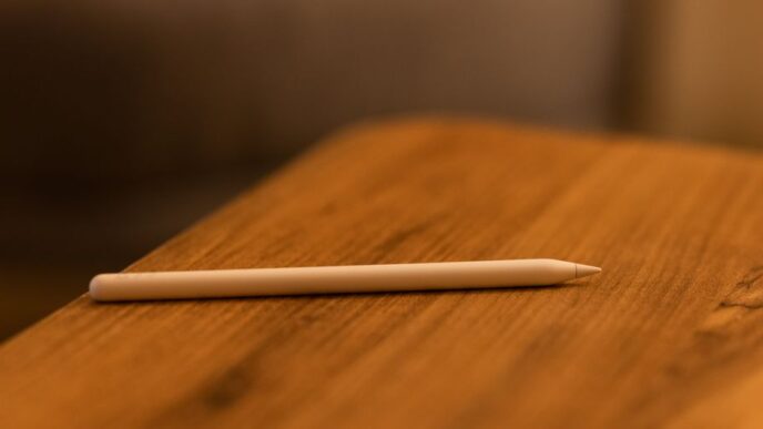 white pen on brown wooden table