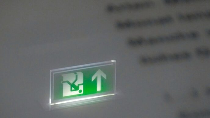 white and green letter x sign