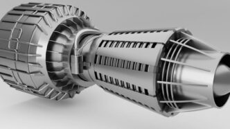 a close up of a metal object on a white surface