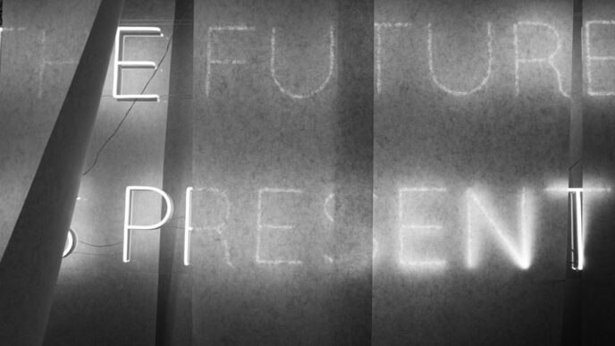 a black and white photo of a blackboard with writing on it