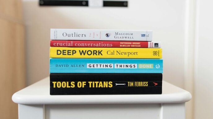 several books on top of table inside room