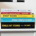 several books on top of table inside room