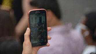 a person holding a cell phone
