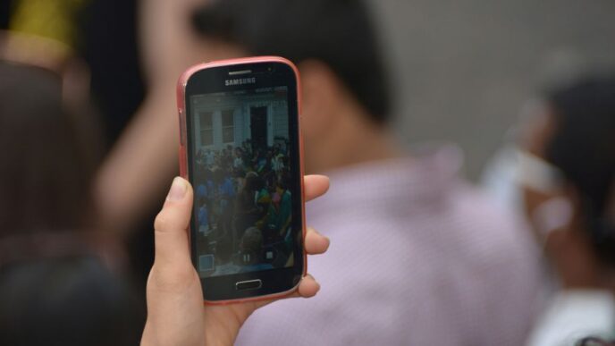 a person holding a cell phone