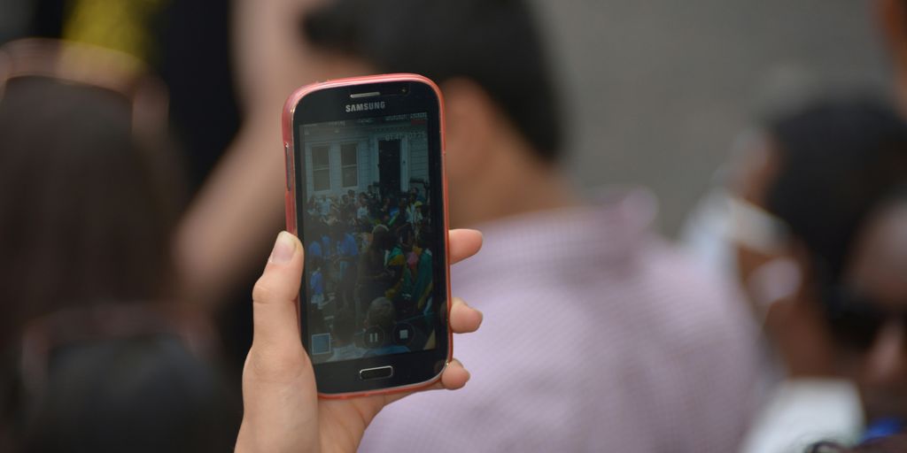 a person holding a cell phone