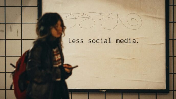 a woman standing in front of a sign that says less social media