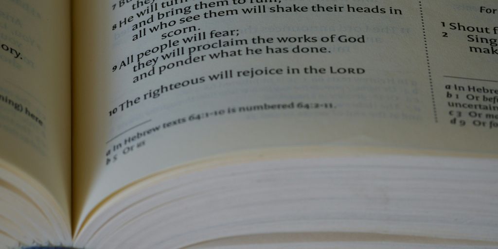 a close up of an open book on a table