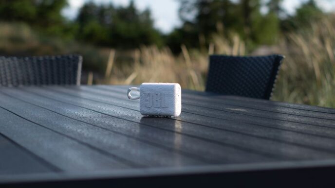 an electronic device sitting on top of a wooden table