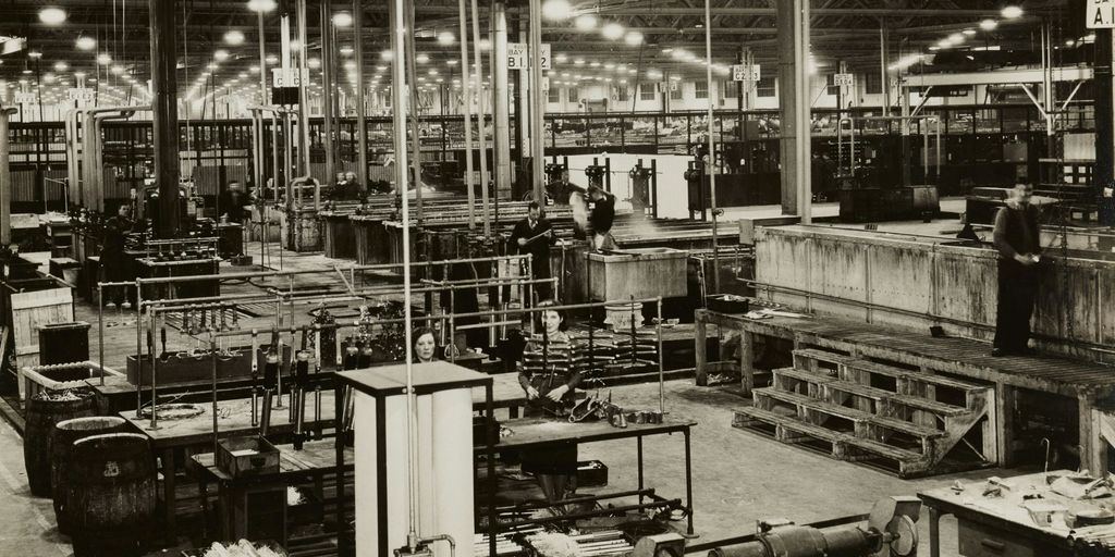 grayscale photo of industrial machine