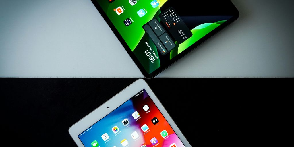 black ipad on white table